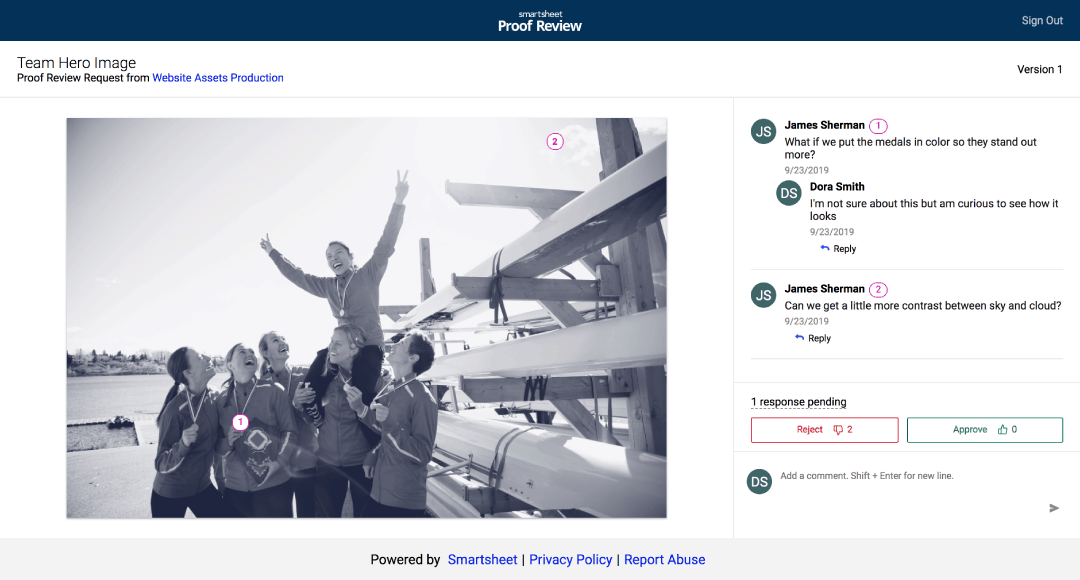 Proof review example with comments and approval responses in Smartsheet